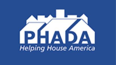 PHADA letters in reverse over row of houses, Helping House America below it